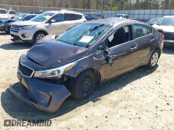 2018 Kia Forte LX with VIN 3KPFL4A71JE201144, listed as a IAAI auction lot 41874778 with 100,980 mi miles. Bid and sale history available at carsss.com. Image 2.