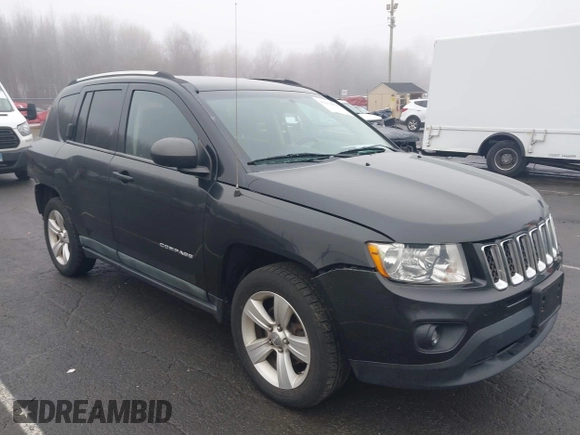 2011 Jeep Compass Latitude with VIN 1J4NF1FBXBD223378, listed as a IAAI auction lot 41919670 with 151,036 mi miles. Bid and sale history available at carsss.com. Image 1.