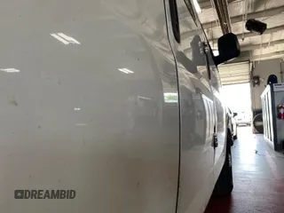 2014 Chevrolet Express Cargo with VIN 1GCWGFCA2E1184095, listed as a IAAI auction lot 42725036 with 270,636 mi miles and . Bid and sale history available at DreamBid. Image 32.