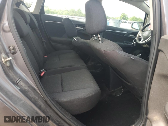 2015 Honda Fit EX-L z VIN 3HGGK5H83FM757658, wystawiony jako Copart lot #59907425 z przebiegiem 139 053 mil mil oraz Szkoda całkowita • Salvage title. Historia ofert i sprzedaży dostępna na DreamBid. Obrazek 10.