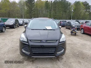 2015 Ford Escape SE with VIN 1FMCU0GX3FUC73452, listed as a IAAI auction lot 41923211 with 140,952 mi miles. Bid and sale history available at carsss.com. Image 6.