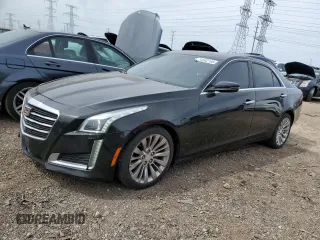 2015 Cadillac CTS Luxury AWD with VIN 1G6AX5SX6F0115950, listed as a Copart auction lot 54502195 with 118,256 mi miles and Salvage title. Bid and sale history available at DreamBid. Image 1.