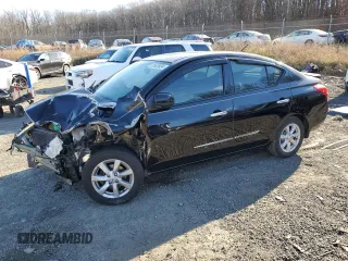 2014 Nissan Versa SV with VIN 3N1CN7AP1EL868279, listed as a Copart auction lot 87431124 with 90,979 mi miles and Salvage Title. Bid and sale history available at carsss.com. Image 1.
