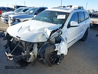 2021 Jeep Grand Cherokee Laredo X with VIN 1C4RJEAG6MC658195, listed as a IAAI auction lot 41414668 with 52,488 mi miles and . Bid and sale history available at DreamBid. Image 2.