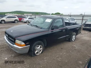 1998 Dodge Dakota SLT with VIN 1B7FL26X0WS720008, listed as a IAAI auction lot 42120683 with 194,922 mi miles and . Bid and sale history available at carsss.com. Image 2.