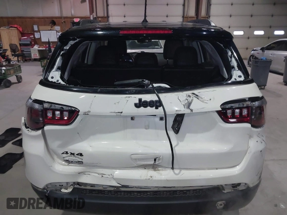 2018 Jeep Compass Latitude with VIN 3C4NJDBB6JT453973, listed as a IAAI auction lot 41153555 with 105,210 mi miles. Bid and sale history available at carsss.com. Image 6.