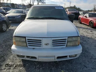 1999 Oldsmobile Bravada z VIN 1GHDT13W8X2717155, wystawiony jako Copart lot #84807244 z przebiegiem 144 805 mil mil oraz Szkoda całkowita • Salvage title. Historia ofert i sprzedaży dostępna na DreamBid. Obrazek 5.