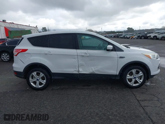 2013 Ford Escape SE with VIN 1FMCU9G93DUA17816, listed as a IAAI auction lot 41688140 with 129,738 mi miles. Bid and sale history available at carsss.com. Image 13.