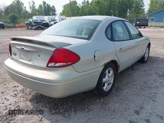 2004 Ford Taurus SE with VIN 1FAFP53U64A137175, listed as a IAAI auction lot 42824008 with 227,328 mi miles and . Bid and sale history available at DreamBid. Image 4.