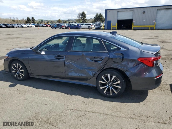 2022 Honda Civic Sedan EX with VIN 2HGFE1F73NH326997, listed as a Copart auction lot 50908925 with 33,930 mi miles and Salvage Title. Bid and sale history available at carsss.com. Image 2.