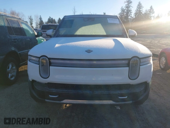 2025 Rivian R1S Adventure z VIN 7PDSGBBA3SN052257, wystawiony jako IAAI lot #41289615 z przebiegiem 2746 mil mil oraz . Historia ofert i sprzedaży dostępna na DreamBid. Obrazek 13.