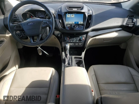 2017 Ford Escape Titanium with VIN 1FMCU9JD8HUE83650, listed as a Copart auction lot 48498245 with 103,920 mi miles and Salvage Title. Bid and sale history available at carsss.com. Image 8.
