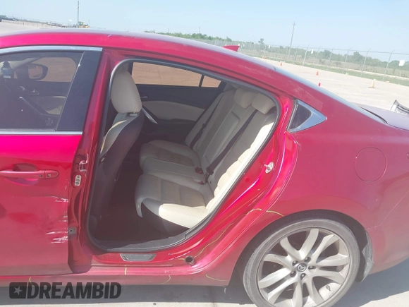 2014 Mazda 6 i Grand Touring with VIN JM1GJ1W65E1141953, listed as a IAAI auction lot 42027145 with 187,514 mi miles and . Bid and sale history available at DreamBid. Image 6.