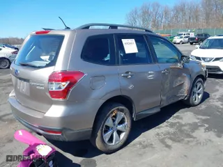 2015 Subaru Forester 2.5i with VIN JF2SJABC7FH438433, listed as a IAAI auction lot 41826011 with 115,657 mi miles. Bid and sale history available at carsss.com. Image 4.