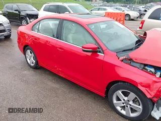 2014 Volkswagen Jetta TDI w/Premium/Nav with VIN 3VWLL7AJ4EM383351, listed as a IAAI auction lot 42424074 with 66,824 mi miles and . Bid and sale history available at DreamBid. Image 18.