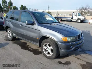 2003 BMW X5 3.0i with VIN 5UXFA53573LV83812, listed as a IAAI auction lot 41590046 with 166,841 mi miles. Bid and sale history available at carsss.com. Image 1.
