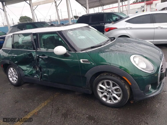 2016 MINI Cooper Clubman with VIN WMWLN5C55G2E07099, listed as a IAAI auction lot 41507429 with 53,271 mi miles. Bid and sale history available at carsss.com. Image 13.