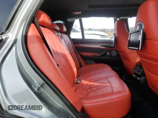 2015 BMW X5 M z VIN 5YMKT6C55F0C89017, wystawiony jako Copart lot #49052065 z przebiegiem 125 287 mil mil oraz Tytuł czysty. Historia ofert i sprzedaży dostępna na DreamBid. Obrazek 11.