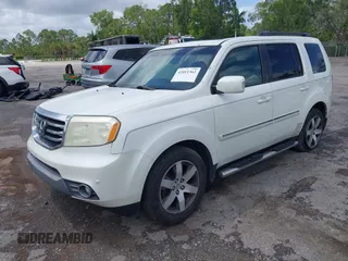 2012 Honda Pilot Touring with VIN 5FNYF3H9XCB035494, listed as a IAAI auction lot 42011362 with 271,887 mi miles and . Bid and sale history available at carsss.com. Image 18.