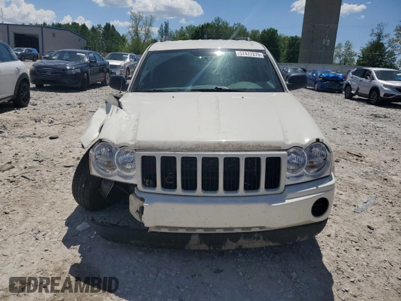 2005 Jeep Grand Cherokee Laredo with VIN 1J4GR48K05C625144, listed as a Copart auction lot 57477275 with 167,654 mi miles and Salvage title. Bid and sale history available at DreamBid. Image 5.