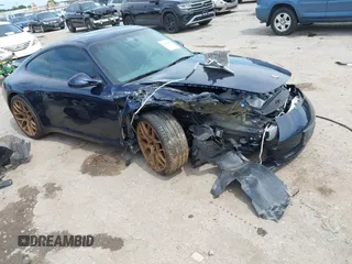 2009 Porsche 911 Carrera с VIN WP0AA29909S706613, выставлен на аукционе IAAI как лот 42353082 с пробегом 96 207 миль миль и . История ставок и продаж доступна на DreamBid. Изображение 1.