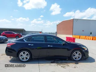 2015 Nissan Altima SL with VIN 1N4BL3AP2FC184822, listed as a IAAI auction lot 42510415 with 137,232 mi miles and . Bid and sale history available at DreamBid. Image 13.