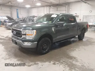 2021 Ford F-150 XL with VIN 1FTFW1E59MKD82204, listed as a IAAI auction lot 41466186 with 56,839 mi miles. Bid and sale history available at carsss.com. Image 2.