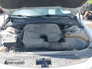 2013 Chrysler 300 with VIN 2C3CCAAG9DH588198, listed as a IAAI auction lot 42556294 with 171,765 mi miles and . Bid and sale history available at DreamBid. Image 10.