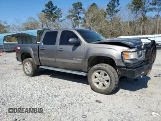 2013 GMC Sierra 1500 SLT with VIN 3GTP2WE71DG236708, listed as a Copart auction lot 50181885 with 205,620 mi miles and Salvage title. Bid and sale history available at DreamBid. Image 4.