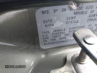 2004 Suzuki Forenza S z VIN KL5JD52Z64K027219, wystawiony jako IAAI lot #41799510 z przebiegiem Nie podano mil oraz . Historia ofert i sprzedaży dostępna na DreamBid. Obrazek 9.