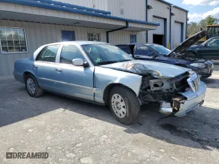 2004 Mercury Grand Marquis GS with VIN 2MEFM74W04X681336, listed as a Copart auction lot 53532255 with 154,238 mi miles and Clean Title. Bid and sale history available at carsss.com. Image 4.