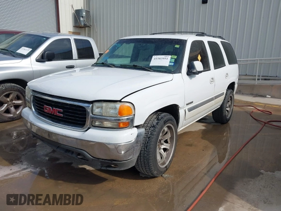 2002 GMC Yukon SLT z VIN 1GKEC13V02R300098, wystawiony jako IAAI lot #41583951 z przebiegiem 247 780 mil mil oraz . Historia ofert i sprzedaży dostępna na DreamBid. Obrazek 2.