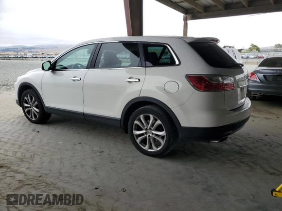 2012 Mazda CX-9 Grand Touring with VIN JM3TB3DV2C0336355, listed as a Copart auction lot 61687975 with 150,580 mi miles and Salvage title. Bid and sale history available at DreamBid. Image 2.