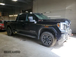 2020 GMC Sierra 2500HD AT4 z VIN 1GT49PEY7LF135671, wystawiony jako Copart lot #55740405 z przebiegiem 80 382 mil mil oraz Szkody całkowita. Historia ofert i sprzedaży dostępna na DreamBid. Obrazek 4.