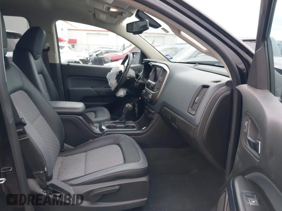 2021 Chevrolet Colorado 2WD Z71 with VIN 1GCGSDEN3M1108777, listed as a IAAI auction lot 41562874 with 77,607 mi miles and . Bid and sale history available at DreamBid. Image 5.