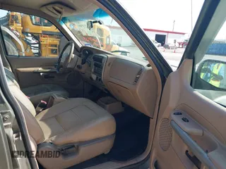 2001 Ford Explorer Sport Trac with VIN 1FMZU67E61UB92823, listed as a IAAI auction lot 42513900 with 186,525 mi miles and . Bid and sale history available at DreamBid. Image 5.