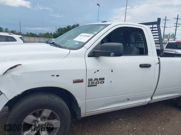 2019 Ram 1500 Classic Tradesman with VIN 3C6JR6DT8KG506165, listed as a IAAI auction lot 40721848 with 323,427 mi miles. Bid and sale history available at carsss.com. Image 6.
