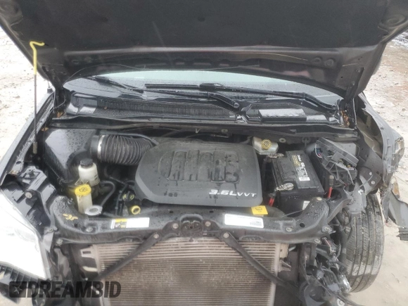 2016 Dodge Grand Caravan SE Plus z VIN 2C4RDGBG9GR196020, wystawiony jako Copart lot #59126905 z przebiegiem 164 844 mil mil oraz Szkoda całkowita • Salvage title. Historia ofert i sprzedaży dostępna na DreamBid. Obrazek 12.