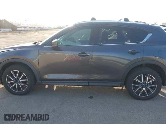 2018 Mazda CX-5 Grand Touring with VIN JM3KFBDM0J0405574, listed as a IAAI auction lot 41725319 with 44,380 mi miles. Bid and sale history available at carsss.com. Image 14.
