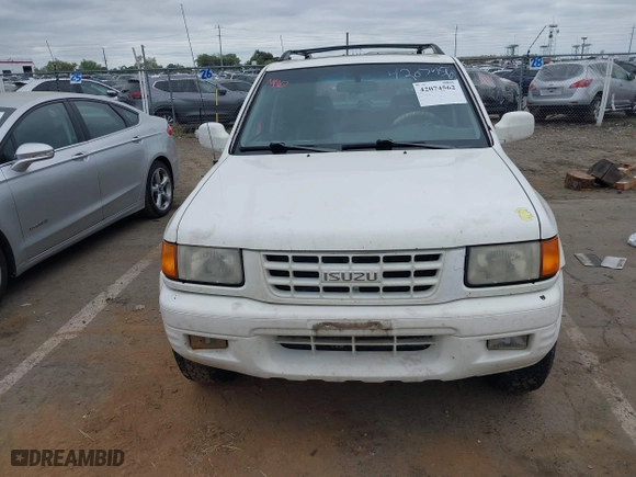 1998 Isuzu Rodeo S with VIN 4S2CM58W0W4331738, listed as a IAAI auction lot 42074562 with 237,684 mi miles. Bid and sale history available at carsss.com. Image 6.