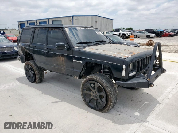 1998 Jeep Cherokee Sport z VIN 1J4FJ68S8WL193483, wystawiony jako Copart lot #58368705 z przebiegiem 94 462 mil mil oraz Szkoda całkowita • Salvage title. Historia ofert i sprzedaży dostępna na DreamBid. Obrazek 4.