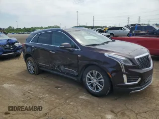 2021 Cadillac XT5 FWD Premium Luxury with VIN 1GYKNCRS9MZ217560, listed as a Copart auction lot 60733295 with 52,242 mi miles and Salvage title. Bid and sale history available at DreamBid. Image 4.