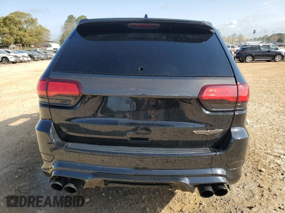 2018 Jeep Grand Cherokee Trackhawk with VIN 1C4RJFN93JC223647, listed as a Copart auction lot 51947265 with Not provided miles and Non repairable. Bid and sale history available at DreamBid. Image 6.