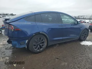 2023 Tesla Model X with VIN 7SAXCDE50PF430739, listed as a Copart auction lot 43069745 with 13,942 mi miles and Salvage Title. Bid and sale history available at DreamBid. Image 3.