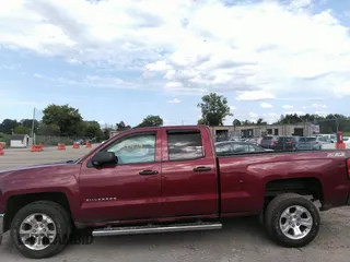 2014 Chevrolet Silverado 1500 LT with VIN 1GCVKREC1EZ220239, listed as a IAAI auction lot 37138278 with 86,715 mi miles and . Bid and sale history available at DreamBid. Image 14.