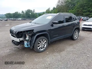 2014 Jeep Cherokee Limited with VIN 1C4PJMDS2EW120384, listed as a IAAI auction lot 42667778 with 121,206 mi miles and . Bid and sale history available at DreamBid. Image 2.