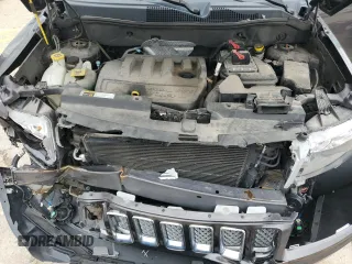 2014 Jeep Compass Latitude with VIN 1C4NJDEB4ED904731, listed as a Copart auction lot 51809165 with 104,760 mi miles and Salvage Title. Bid and sale history available at DreamBid. Image 12.