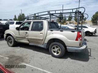 2005 Ford Explorer Sport Trac XLS with VIN 1FMZU67K05UA59602, listed as a Copart auction lot 56756175 with 136,440 mi miles and Salvage title. Bid and sale history available at DreamBid. Image 2.