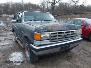 1987 Ford Bronco XL with VIN 1FMEU15N4HLA38776, listed as a IAAI auction lot 41767617 with 52,914 mi miles. Bid and sale history available at carsss.com. Image 1.