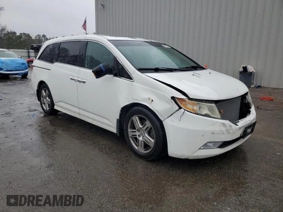 2011 Honda Odyssey Touring Elite with VIN 5FNRL5H94BB084410, listed as a Copart auction lot 48333585 with 223,851 mi miles and Salvage Title. Bid and sale history available at DreamBid. Image 4.